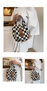 Detail of knit checkerboard tote bag with cute rabbit embroidery and metal snap closure