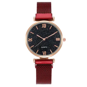 Starry sky dial watch with Roman numerals and red magnetic mesh band for women