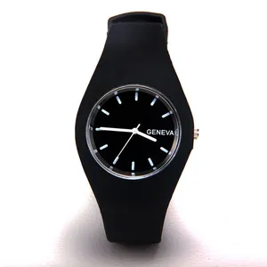 Detail view of black Geneva quartz watch dial with silver indices and silicone strap