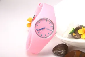 Detailed macro of a pink Geneva quartz watch with silicone strap and floral decor