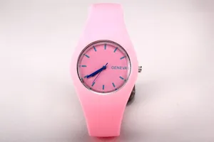 Detail view of pink Geneva silicone watch dial with blue indexes and hands