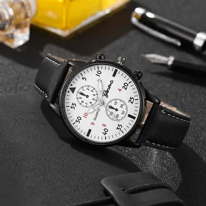 Close-up of Geneva business watch with white dial, black leather strap and metal pen