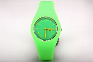 Detail view of the neon green silicone strap and bright yellow markers of quartz watch