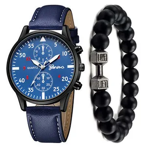 Detail of blue leather watch strap with stitching and matte black beaded bracelet