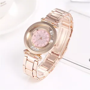 Damen-Armbanduhr in Roségold mit funkelnden Kristallen und römischen Ziffern