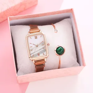 Elegant rose gold square watch with marble dial and matching green stone bracelet in gift box