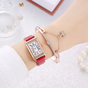 Elegant women's rectangular rose gold watch with red leather strap and star bracelet