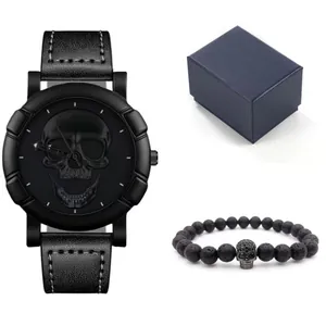 Close-up of black quartz watch with 3D skull relief and matching lava stone bracelet set