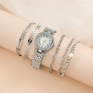 Silver quartz watch with rhinestone set and four matching fashion bracelets for women