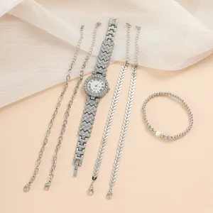 Silver quartz watch set with roman numerals and five rhinestone bracelets for women