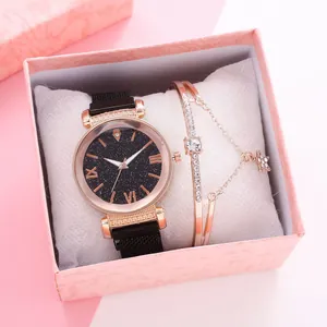 Elegant rose gold watch set with starry black dial and crystal star bracelet in pink gift box