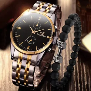 Mens business watch and dumbbell bead bracelet set with two-tone steel strap on wood surface