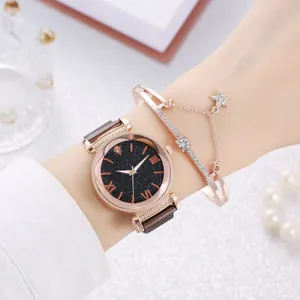 Detail of rose gold starry sky watch and matching rhinestone star bracelet set