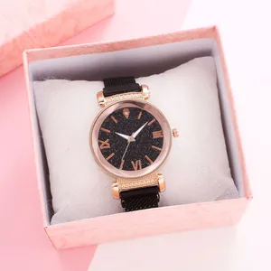 Fashion rose gold women's watch with black starry dial and magnetic mesh strap in a gift box