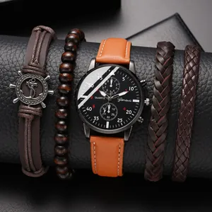 Detail of Geneva quartz watch with leather straps and nautical anchor woven bracelets