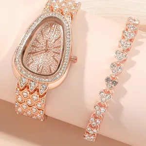 Luxury rose gold women's watch set with crystal serpent dial and heart link bracelet
