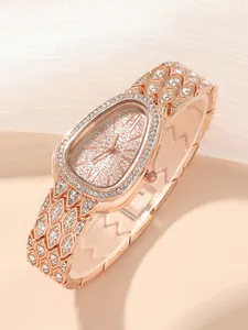Luxury rose gold snake-shaped watch for women adorned with sparkling crystals