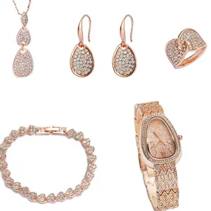 Luxury rose gold women's set with snake head watch and sparkling diamond jewelry pieces