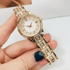 Luxury rose gold women's quartz watch with full crystal inlay and shell dial face