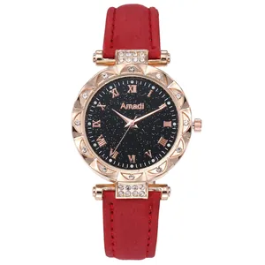 Reloj de cuarzo para mujer con correa de cuero rojo y esfera estrellada con números romanos