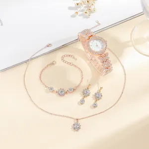 Elegant rose gold watch and flower jewelry set with crystals for women in a gift box
