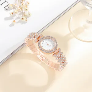 Rose gold quartz watch for women featuring sparkling rhinestones and woven metal strap