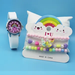 Kids watch set featuring pink rainbow dial and three colorful beaded bracelets with charms