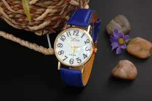 Detail of Geneva quartz watch with blue litchi pattern strap and pearl shell dial