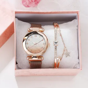Women's rose gold quartz watch with starry sky dial and matching star bracelet in gift box
