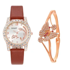Close-up of luxury women's watch with dolphin dial and crystal butterfly bracelet