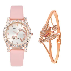 Detail of luxury pink leather watch with rhinestone bezel and butterfly bangle set