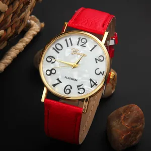 Fashion Geneva watch featuring red leather strap and golden shell dial for women