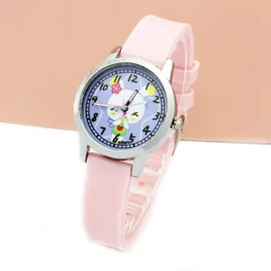 Detailed close-up of a pink silicone kids watch with a cute rabbit face and colorful numbers