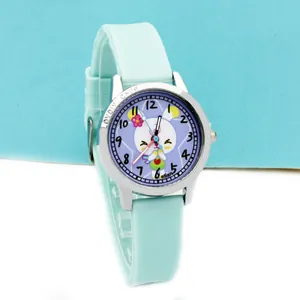 Close-up of kids quartz watch featuring mint blue strap and cute rabbit dial pattern