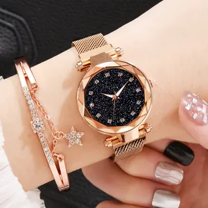 Rose gold Milanese mesh strap watch with starry blue dial and matching star bracelet