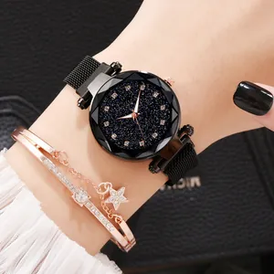 Close-up of starry sky dial watch with Milanese magnetic strap and matching star bracelet