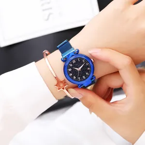Montre ciel étoilé élégante avec bracelet en maille bleue et bracelet étoile or rose assorti
