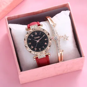 Damen-Roségold-Uhr und Stern-Armband-Set mit rotem Band in einer rosa Geschenkbox