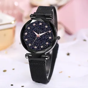 Women's starry blue watch with mesh strap and crystal scales in an elegant gift setting