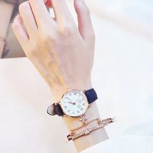 Coffret montre quartz étoile or rose avec bracelet en cuir bleu marine et jonc assorti