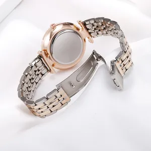 Back view of women's quartz watch with rose gold case and silver metal strap