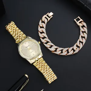 Gold quartz watch set with iced-out Cuban chain bracelet on black background