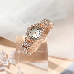 Luxurious rose gold quartz watch with rhinestones on a white dial and diamond-set strap