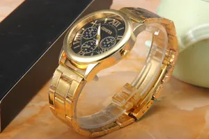 Close-up of Geneva gold-plated men's watch with black Roman dial and three sub-dials