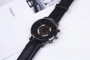 Close-up of Geneva men's quartz watch with black leather strap and golden dial details