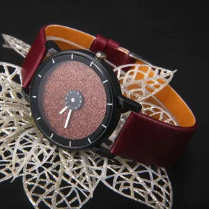 Orologio quadrante stellato con disco rotante e cinturino in pelle bordeaux