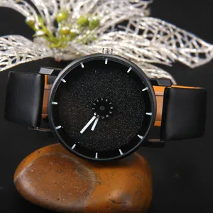 Orologio al quarzo nero minimalista con quadrante stellato su pietra e decoro metallo