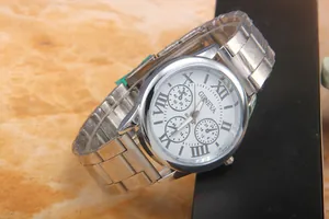 Detail of silver Geneva quartz watch with white Roman dial and protective strap film