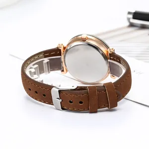 Back view of elegant women's watch with rose gold case and brown leather strap