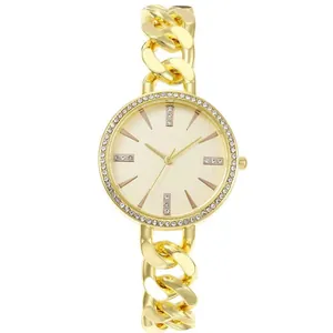 Women gold watch with rhinestone bezel and Cuban link chain strap on white background